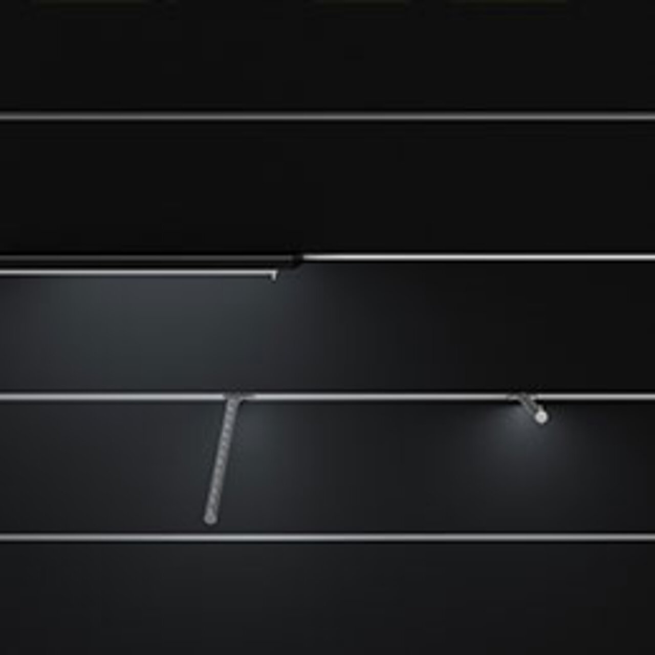 Regalsystem integriert in der Wand mit Beleuchtung. Steht symbolisch für den Bereich "Produktpräsentation"